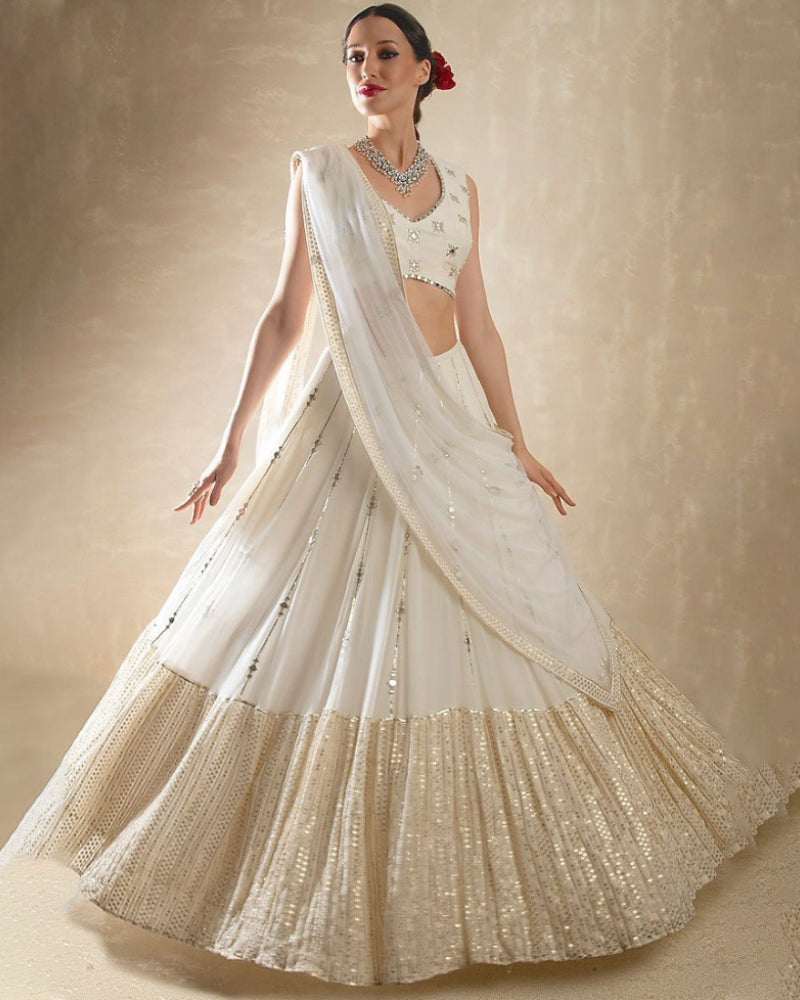 White Colored Bridal Lehenga Choli with Jari Embroidery & Dupatta
